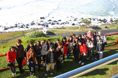 Students on the CNU 2012 Australian Situational Learning Camp pause for a group photo at the Point Danger lookout, at Tweed Heads, New South Wales.