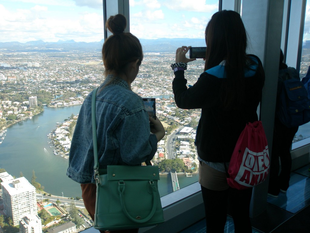 Students Alyssa Lin and Karol Lin (Department of Applied Foreign Language) enjoy a view of the Gold Coast from the Q1 Observation Deck