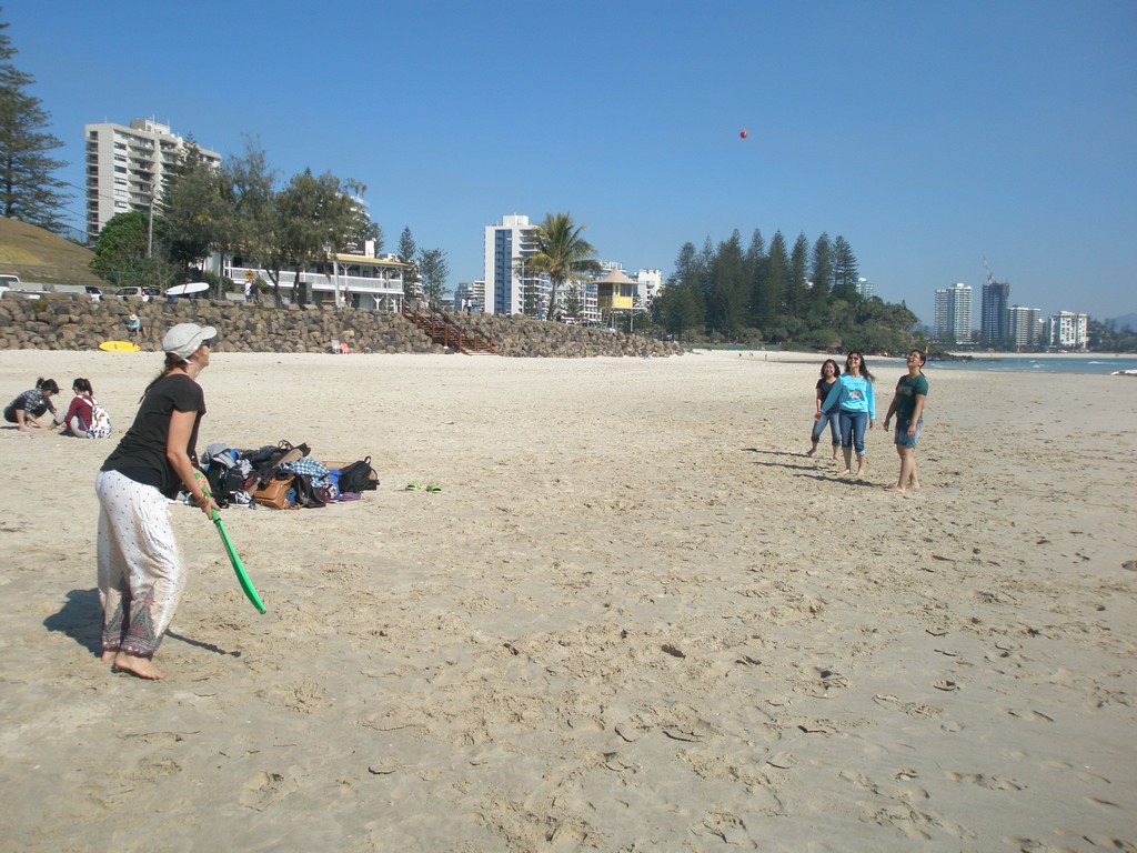 A game of beach cricket with teacher Rose