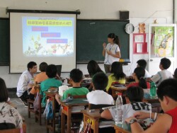Conducting an information session  for elementary school children on the safe use of medicines, and the dangers of smoking and drug abuse