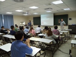 An industry specialist co-teaching a Pharmacy class