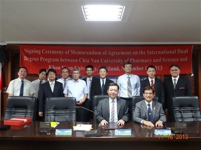 Group photo of participants in the signing ceremony