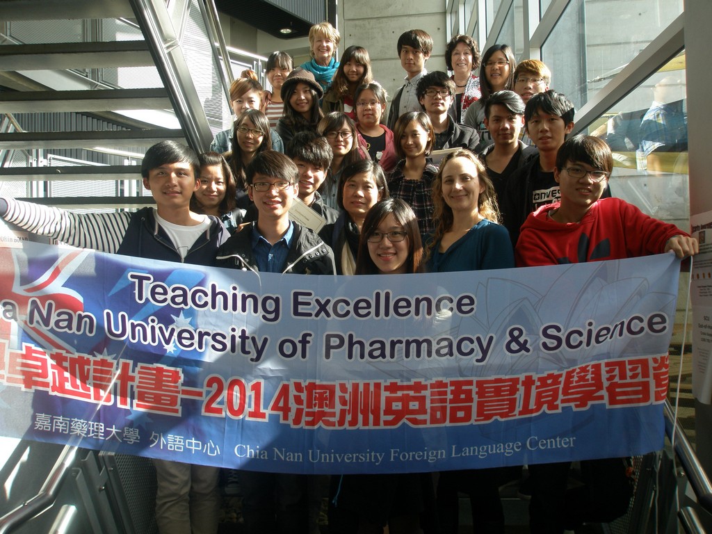 2014 Australian English Study Camp group photo inside Southern Cross University